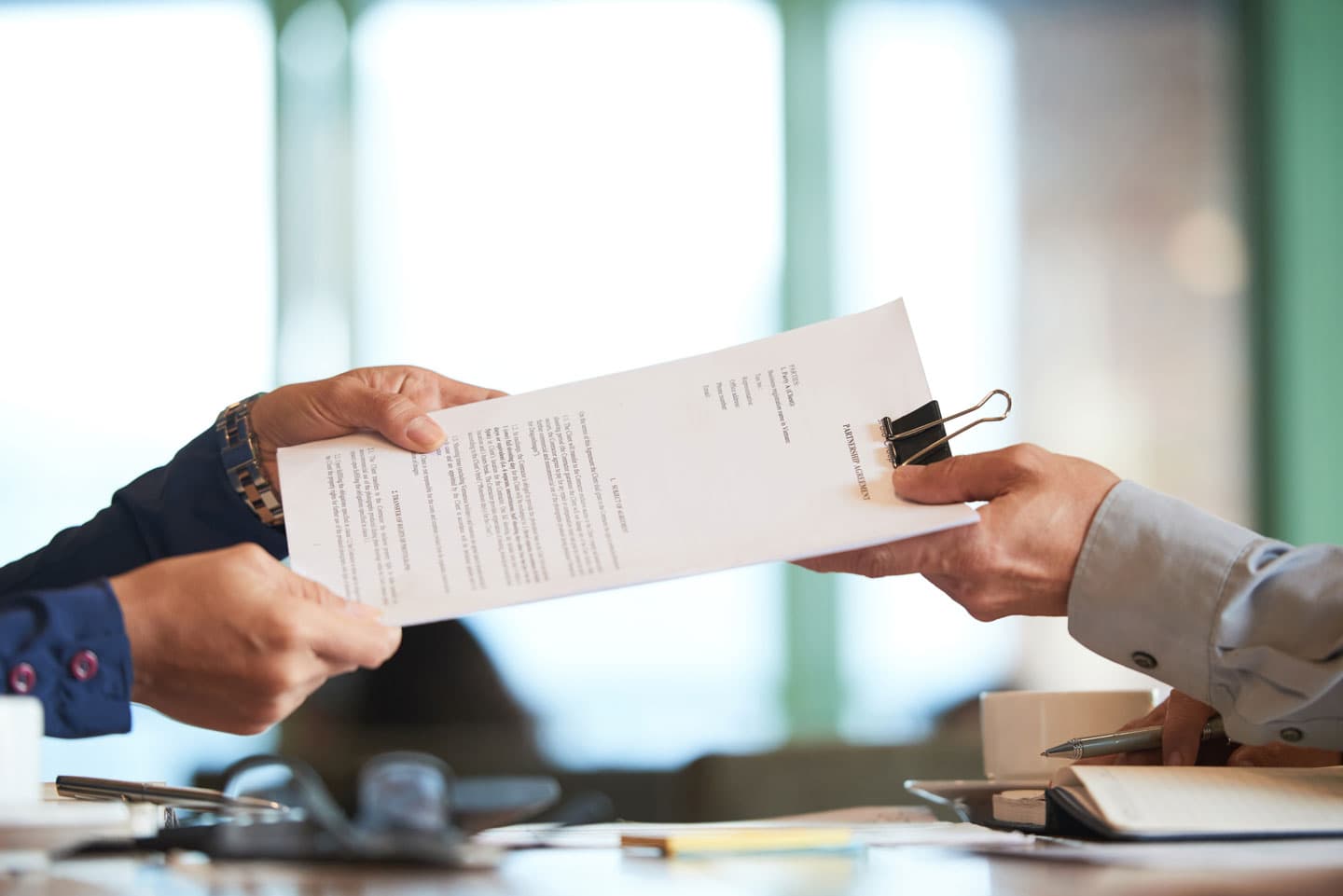 Hospital administrators reviewing empanelment documentation