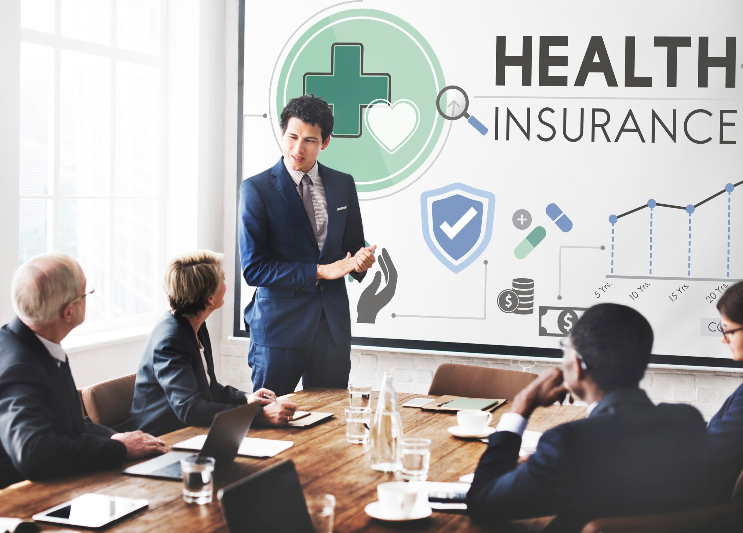 Medicon consultants reviewing health insurance processes with a hospital team